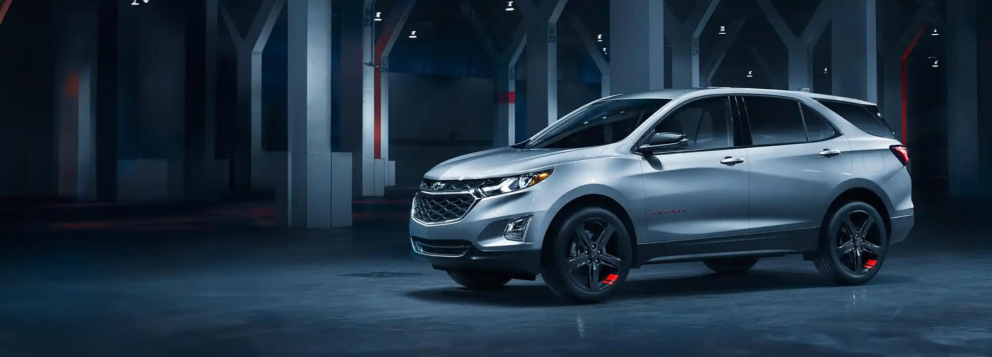 Chris standing up holding his daughter Elva